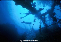 two divers exploring the wreck of Umbria in Sudan Red Sea... by Alberto Romeo 